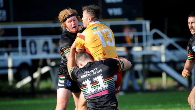 Coffs Harbour lock Macauley Dawson held by the Sawtell defence. Picture: Leigh Jensen