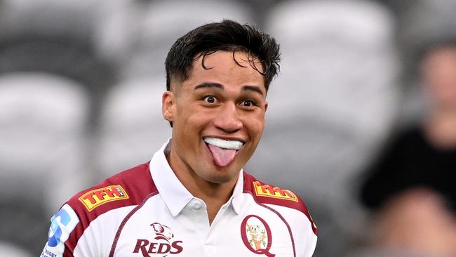 DUNEDIN, NEW ZEALAND - MARCH 22: Kalani Thomas of the Reds  charges over the tryline to score during the round six Super Rugby Pacific match between Highlanders and Queensland Reds at Forsyth Barr Stadium, on March 22, 2025, in Dunedin, New Zealand. (Photo by Joe Allison/Getty Images)