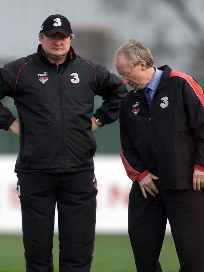 Bruce Reid and Kevin Sheedy watch over a training session at Windy Hill in 2003.