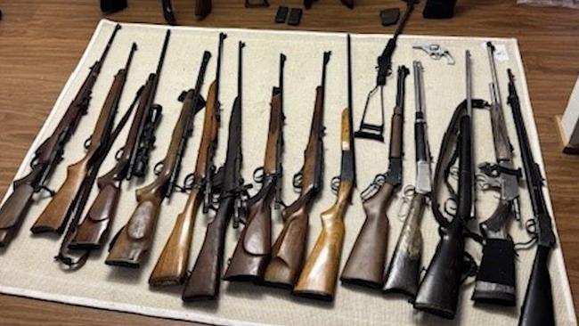 The full cache of weapons found during police raids at the weekend. Picture: QPS