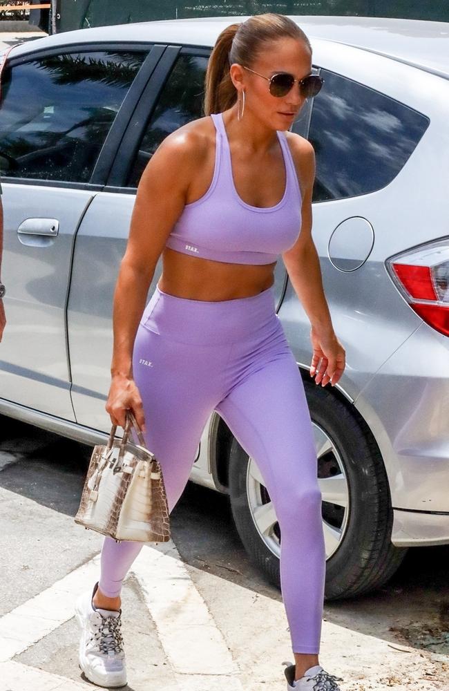 JLo flaunting abs in Aussie activewear brand STAX