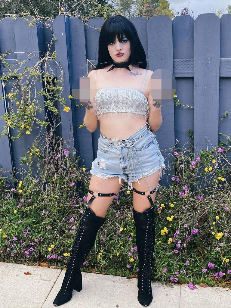 Rovi was wearing ripped denim shorts with a crop top and knee high boots. Picture: TikTok/rovi_wade