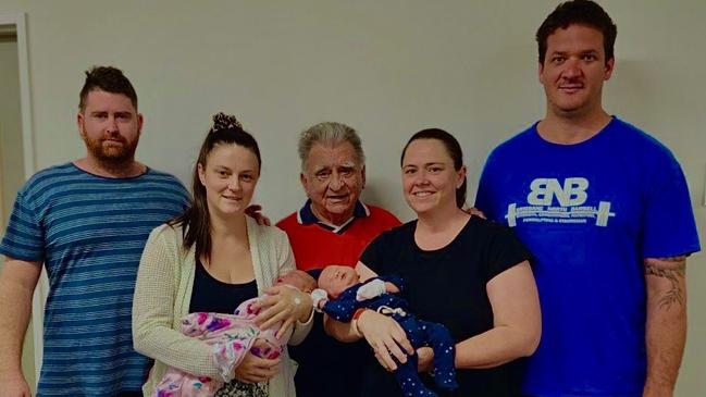 Oh baby: Sunshine Coast's newest "Cousin Twins" Elsie Margaret Lalley and Elliot Luke Nitschke were born hours apart on October 17. Pictured (L-R): Jakob Lalley and Ceri Lewis holding baby Elsie, and Mr Lalley's sister Rebecca Nitschke (second from the right) holding baby Elliott with husband Luke.