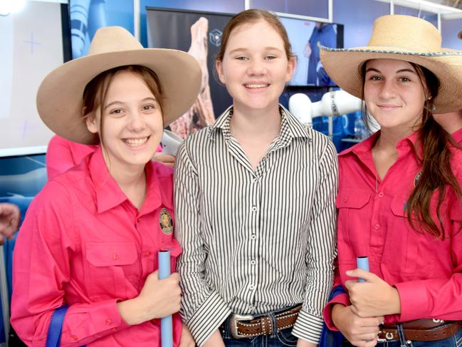 BEEF AUSTRALIA 21: Clare Hills (centre) from Rockhampton Girls Grammar tries out the virtual reality meat processing system