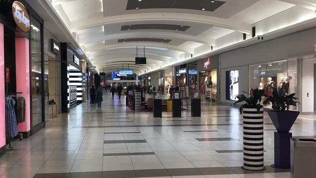 Northland was deserted this morning, with some shops already closed. Picture: Shelley Hadfield