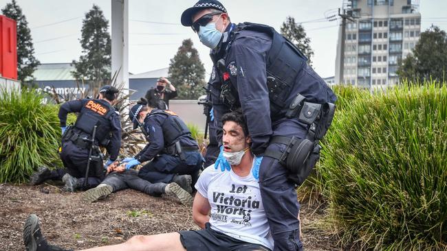 Protesters weren’t social distancing and many didn’t wear masks. Picture: Jake Nowakowski