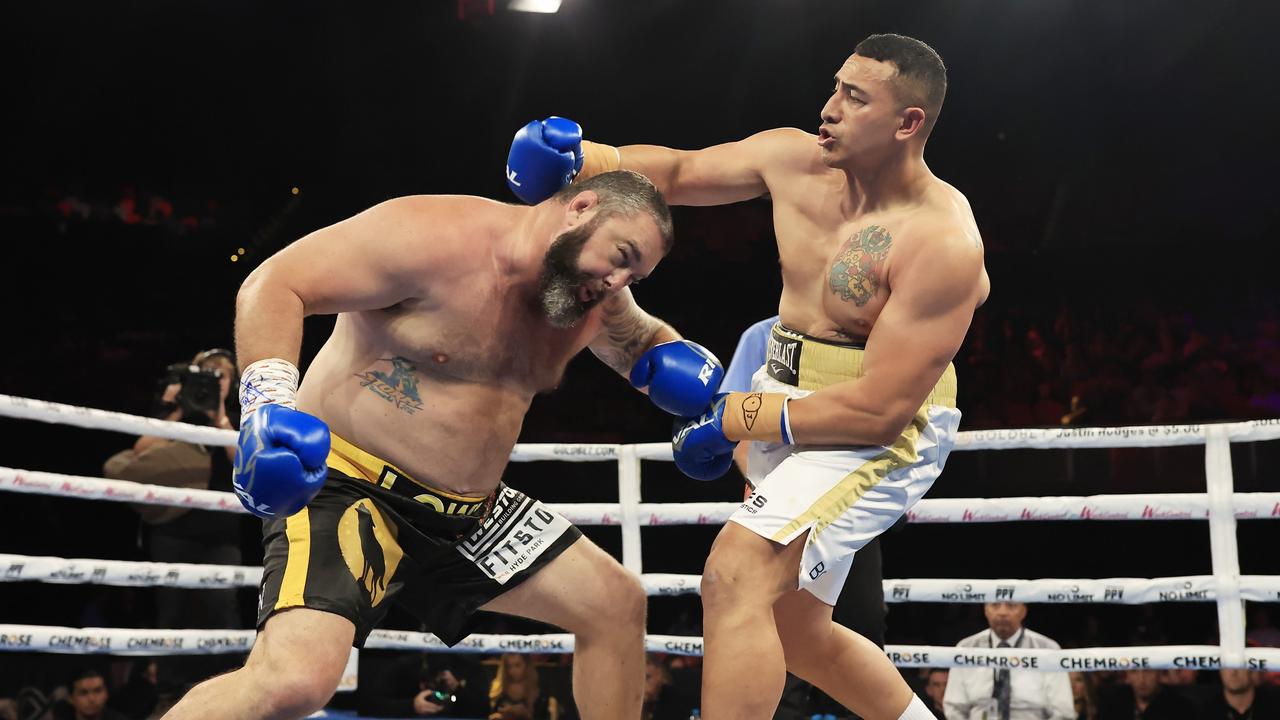 Siosiua Taukeiaho throws against Jaiman Lowe during his professional debut at the Aware Super Theatre on Wednesday. Photo by Mark Evans/Getty Images