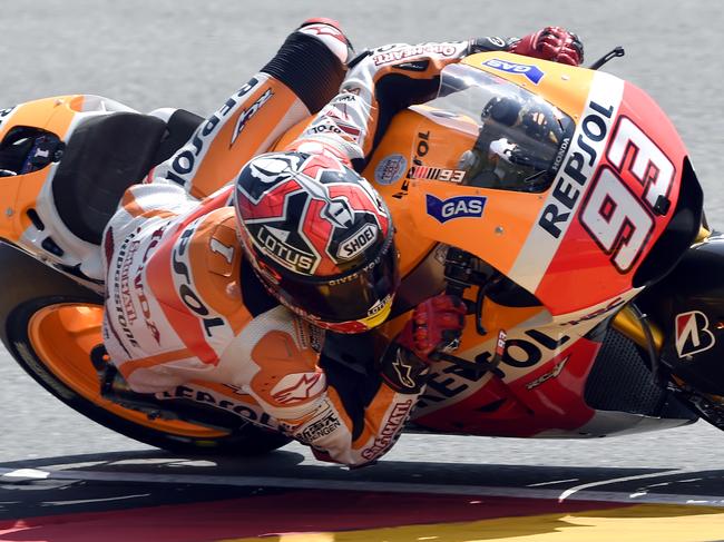 Marc Marquez from Spain speeds up during the MotoGP Qualifying at the Sachsenring circuit in Hohenstein-Ernstthal, Germany, Saturday, July 12, 2014. (AP Photo/Jens Meyer)