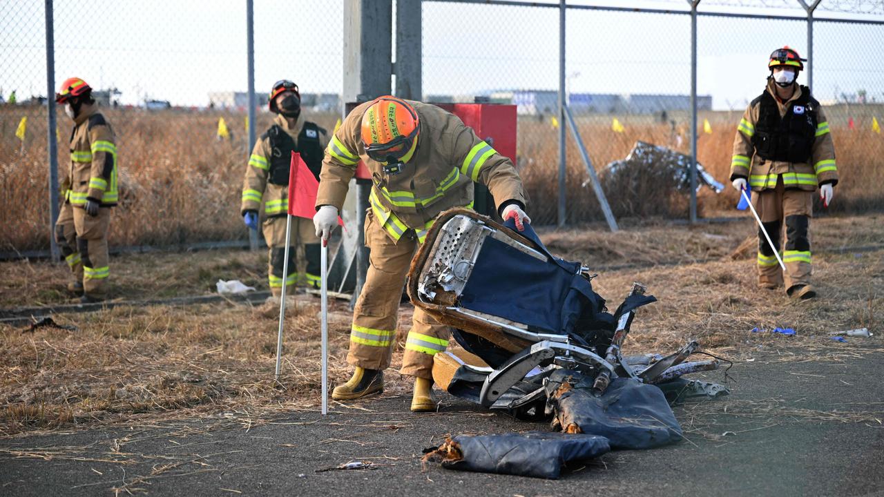 The two black boxes on the Boeing jet stopped recording about four minutes before the accident, officials have said. Picture: Jung Yeon-Je / AFP