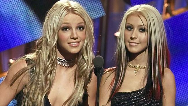 Spears (left) and Aguilera were often pitted against each other in the 90s and early 2000s. Picture: AP