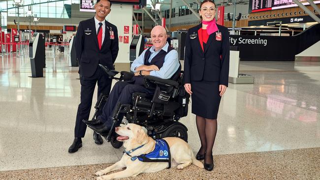 Qantas has partnered with Assistance Dogs Australia to support people with disability to fly. Photo: Qantas