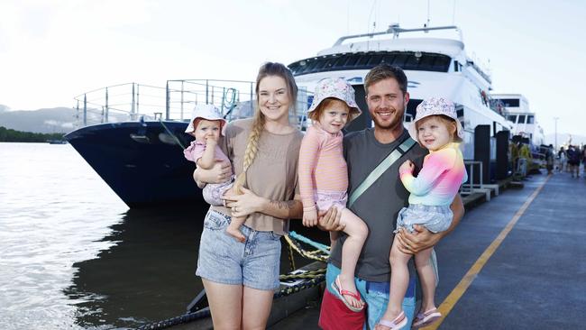 Tourism Tropical North Queensland is encouraging Far North Queenslanders to become tourists in their own backyard with the Tropical Dollars campaign, which offers $100 off a range of tourism experiences. Tanah and Dan Freebody of Mt Sheridan used the tropical dollars to take their young daughters Zalee, 1, Kenzi, 3, and Halle, 2, out to the Great Barrier Reef on Reef Unlimited's Reef Magic vessel. Picture: Brendan Radke