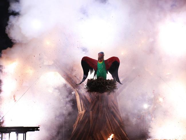 The Swift Parrot surrounded fireworks going off at the Ogoh Ogoh burning at Macquarie Point. Picture: LUKE BOWDEN