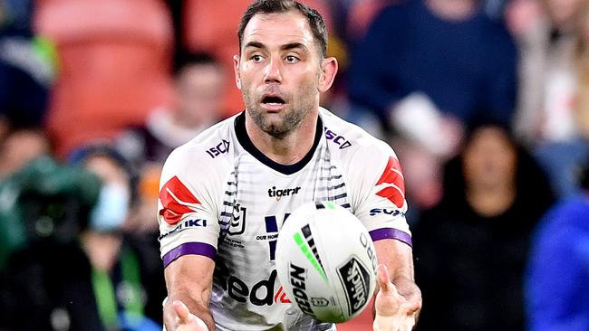 BRISBANE, AUSTRALIA - JULY 24: Cameron Smith of the Storm passes the ball during the round 11 NRL match between the Brisbane Broncos and the Melbourne Storm at Suncorp Stadium on July 24, 2020 in Brisbane, Australia. (Photo by Bradley Kanaris/Getty Images)