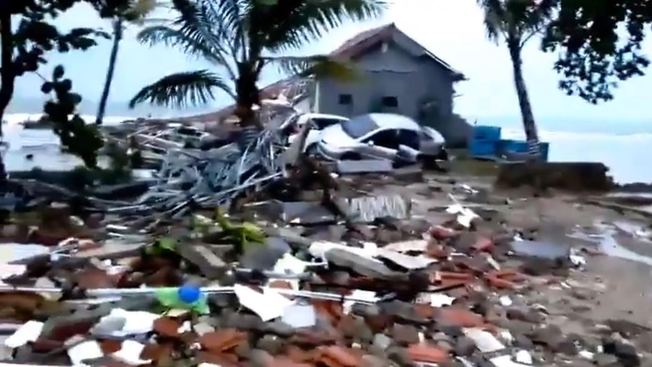 Daylight has revealed the extent of destruction caused by a tsunami in Indonesia.