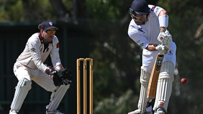 VSDCA: Malvern keeper Sam Huitema watches as Strathmore batter Shea Mulkearns defends. Picture: Andy Brownbill