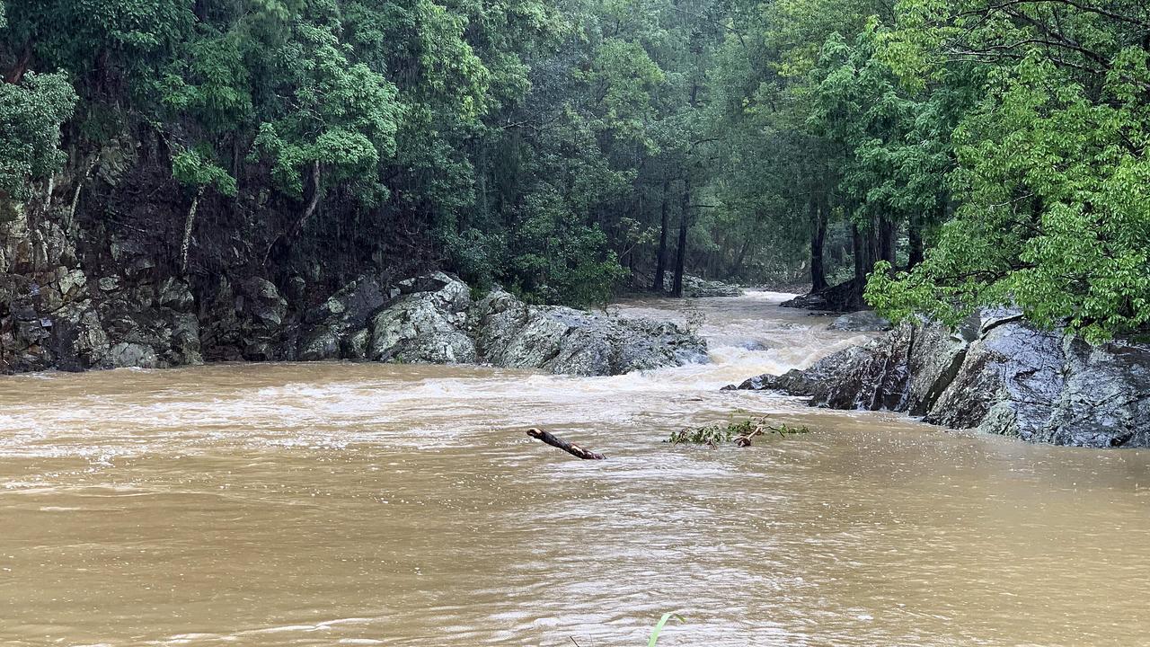 A flooded Currumbin Creek on Queensland’s Gold Coast. Picture: Scott Powick