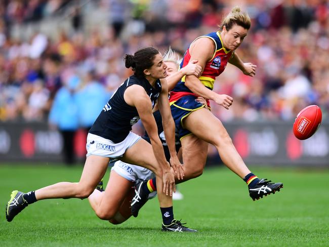 Cramey gets a kick away under pressure during the Crows’ big AFLW grand final win over Carlton in front of a record crowd at Adelaide Oval in 2019. Picture: MARK BRAKE/GETTY IMAGES