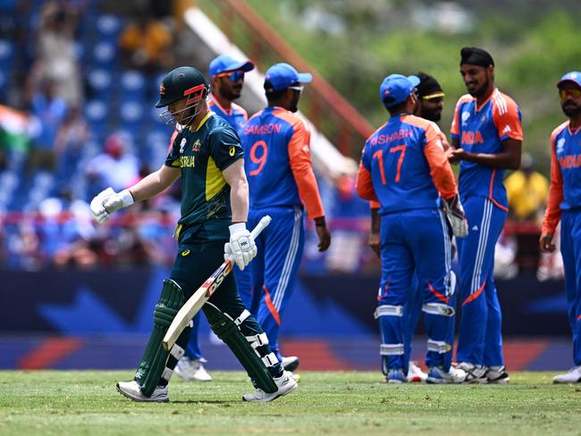 Australia's David Warner walks out after being dismissed during the ICC men's Twenty20 World Cup 2024 Super Eight cricket match between Australia and India at Daren Sammy National Cricket Stadium in Gros Islet, Saint Lucia on June 24, 2024. (Photo by Chandan Khanna / AFP)