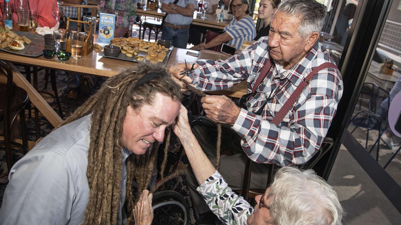 Joel Anderson's nana Maria Anderson and pop Noel Anderson cut off his dreadlocks in a fundraiser for their great granddaughter Charlise Anderson at the Blue Mountain Hotel, Saturday, November 23, 2024. Picture: Kevin Farmer