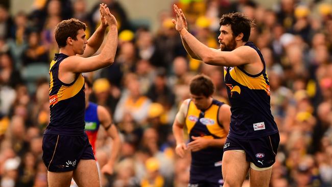 Josh Kennedy (right) kicked another bag of goals against the Lions. Picture: Getty Images