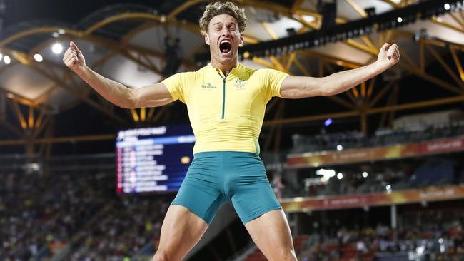 TOPSHOT — Australia’s Kurtis Marschall celebrates in the athletics men's pole vault final during the 2018 Gold Coast Commonwealth Games at the Carrara Stadium on the Gold Coast on April 12, 2018. / AFP PHOTO / Adrian DENNIS