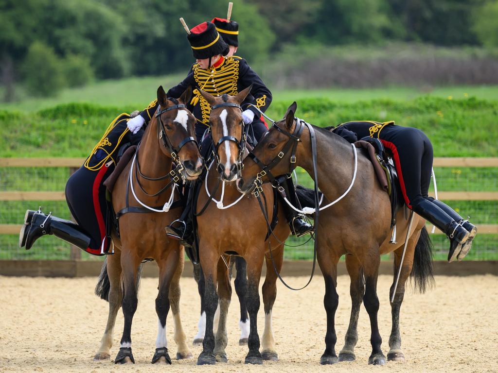 Soldiers in training for the King’s Coronation from the Royal Horse Artillery remount their horses as they take part in the riding assessment at Woolwich Barracks on April 24 in London. Picture: Leon Neal/Getty Images