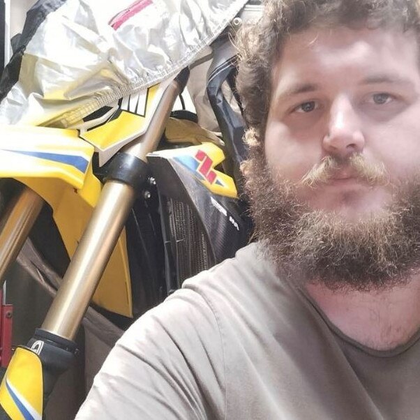 David Nichols has been identified as the man behind the wheel of the ute that crashed into a police van, critically injuring one officer and seriously hurting two others.