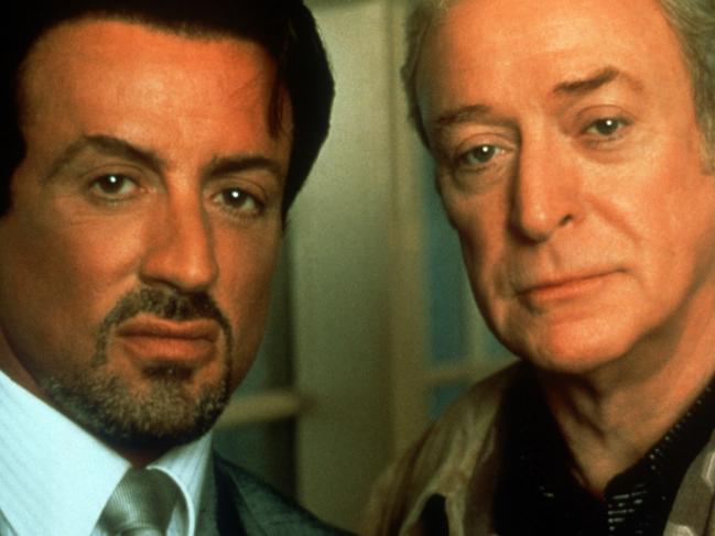 actor Sylvester Stallone and actor Michael Caine in film 'Get Carter'.  headshot movies scene  /Get