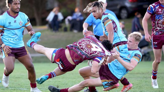 Wavell centre Keyarn Pene is unceremoniously dumped by Jack Hudson. Pic: Steve Pohlner