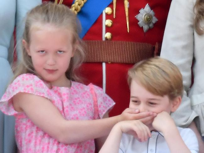 Savannah Phillips silences her younger cousin Prince George. Picture: James Whatling/Mega