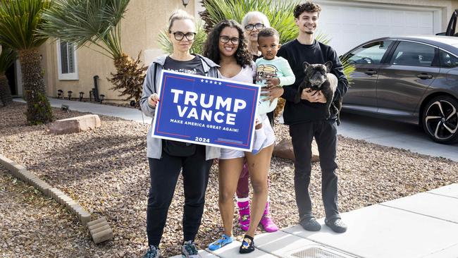 Mesha Aguirre, left, with family members at their home in Henderson. Picture: Aude Guerrucci