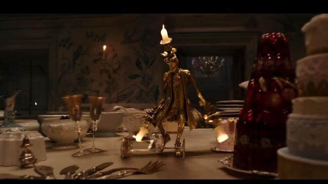 Lumiere prepares for the dinner between Belle and the Beast.