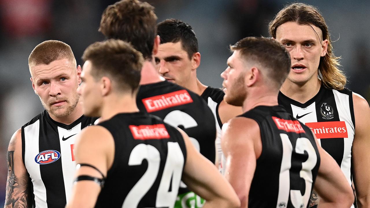 Collingwood players after Friday night’s loss. Picture: Getty Images