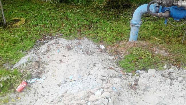 The blue concrete dust alledgly being pumped into the Nimbin Creek. Picture: Rachel Scott