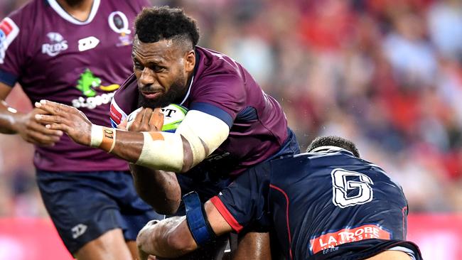 Queensland’s Samu Kerevi is tackled on Saturday night. Picture: Getty Images