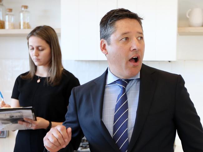 SUNDAY TELEGRAPH - Pictured is Auctioneer Scott Kennedy during an Auction at 16 Moore Street Bondi today. Picture: Tim Hunter.