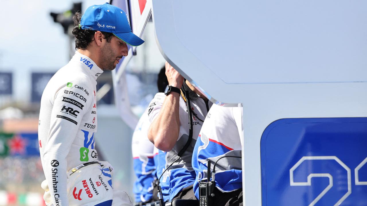 RB's Australian driver Daniel Ricciardo is seen in the pit during the Formula One Japanese Grand Prix race at the Suzuka circuit in Suzuka, Mie prefecture on April 7, 2024, after the red flag was raised following a crash between Williams' Thai driver Alexander Albon and Ricciardo. (Photo by KIM Kyung-Hoon / POOL / AFP)