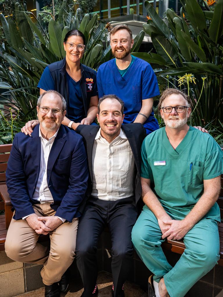 Ben with ICU nurse Rochelle 'Rocky' Smith (back left) and Burns Unit staff Patrick Coghlan (back right), Marcus Wagstaff (front left) and Stuart Harper (front right) at the Royal Adelaide Hospital. Picture: Tom Huntley