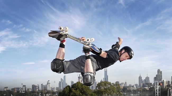 Skateboard legend Tony Hawk flying high over Melbourne on the Tony Hawk skate bowl built at Albert Park Grand Prix track. Picture: David Caird.