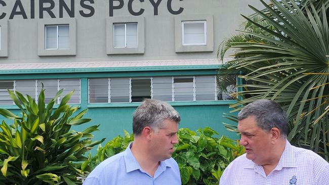 Police Minister Mark Ryan and Queensland Police Union Far North executive member Gil Dyett chat at Cairns PCYC in the wake of a teen's alleged stolen car death. Picture: Chris Calcino