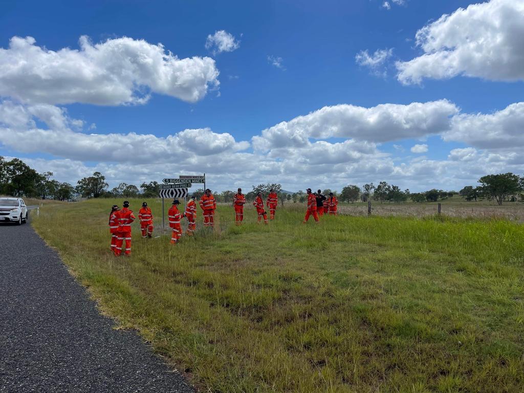 The scene at Biggenden as SES search the surrounding fields after a shed fire claimed two lives.