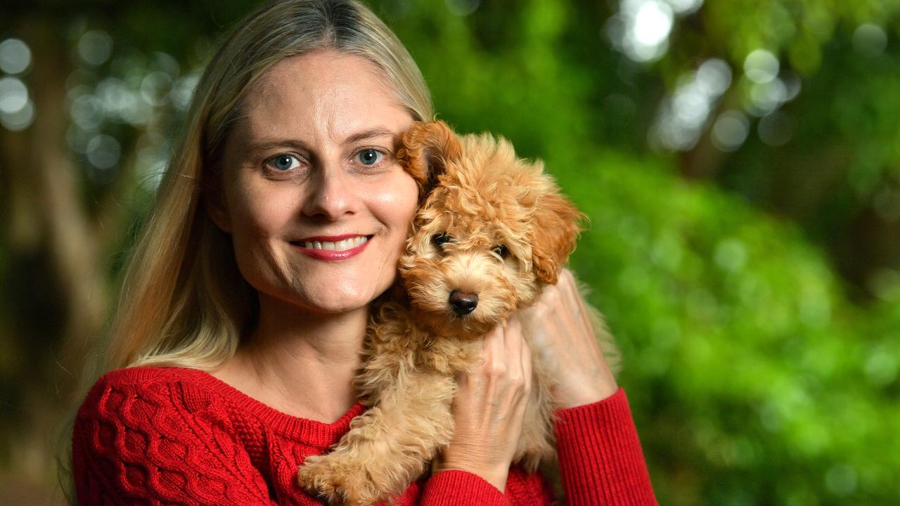 Malu with her store dog