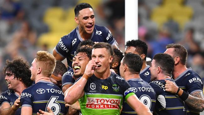 The Cowboys celebrate another try against the Raiders. Picture: Albert Perez/Getty Images