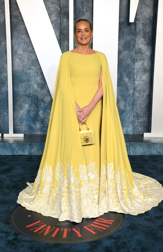 Sharon Stone attends the party in golden yellow. Picture: Getty