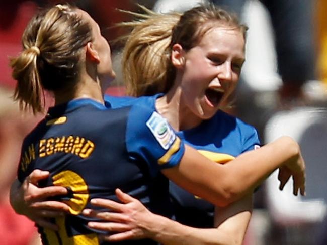 AUGSBURG, GERMANY - JULY 10:  Ellyse Perry (R) of Australia celebrates scoring the first goal with Emily van Egmond (L) during the FIFA Women's World Cup 2011 Quarter Final match between Sweden and Australia at the FIFA Women's World Cup Stadium Augsburg on July 10, 2011 in Augsburg, Germany.  (Photo by Friedemann Vogel/Getty Images)