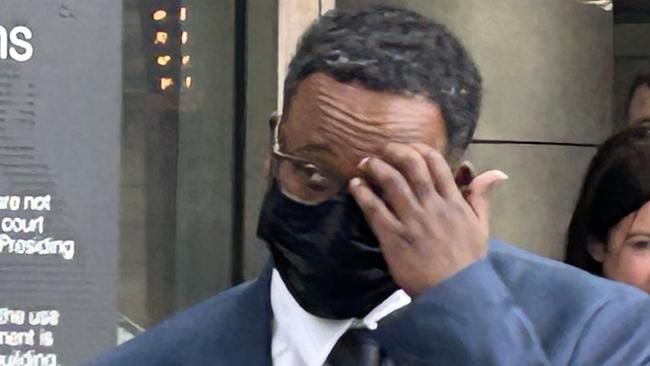 Fraudster Abdulkadir Ibrahim leaves County Court after pleading guilty to rorting taxpayers of nearly $465,000 in fraudulent Medicare claims.