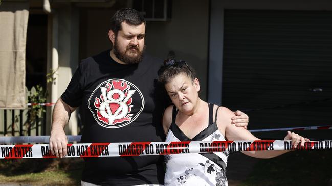 Jenelle Reghenzani, pictured with her son Anthony Dillon, was lucky to escape a fierce electrical fire that destroyed her house on Tuesday afternoon. Her car was then damaged when a stolen car rammed it at Bayview Heights. Picture: Brendan Radke