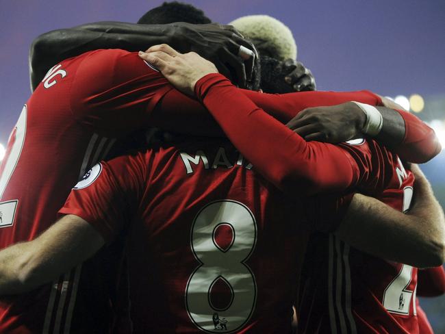 Manchester United's players celebrate.