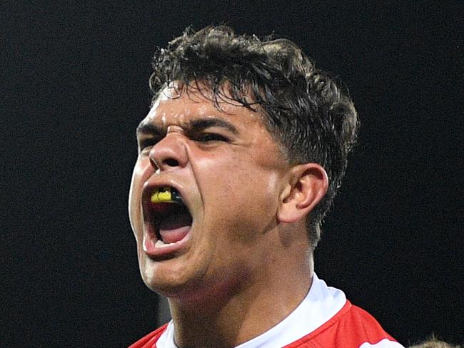 Latrell Mitchell of the Roosters celebrates after scoring a try during the Round 24 NRL match between the Sydney Roosters and the Penrith Panthers at the SCG in Sydney, Saturday, August 31, 2019. (AAP Image/Dan Himbrechts) NO ARCHIVING, EDITORIAL USE ONLY